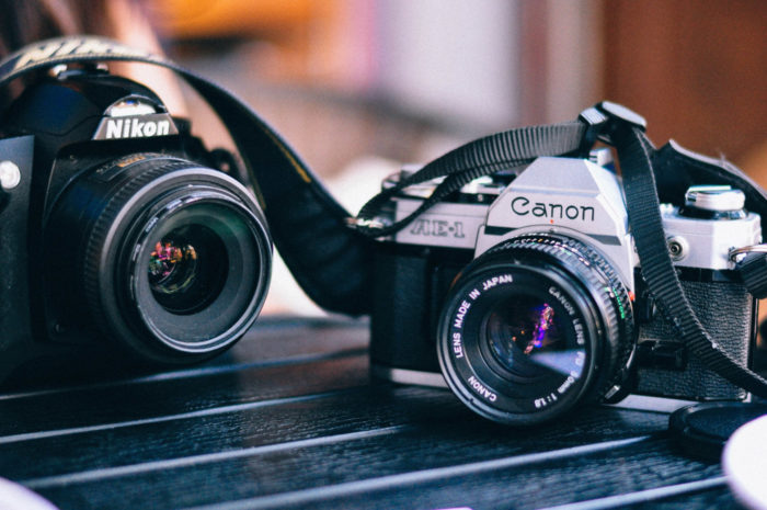 Photo of two DSLR cameras