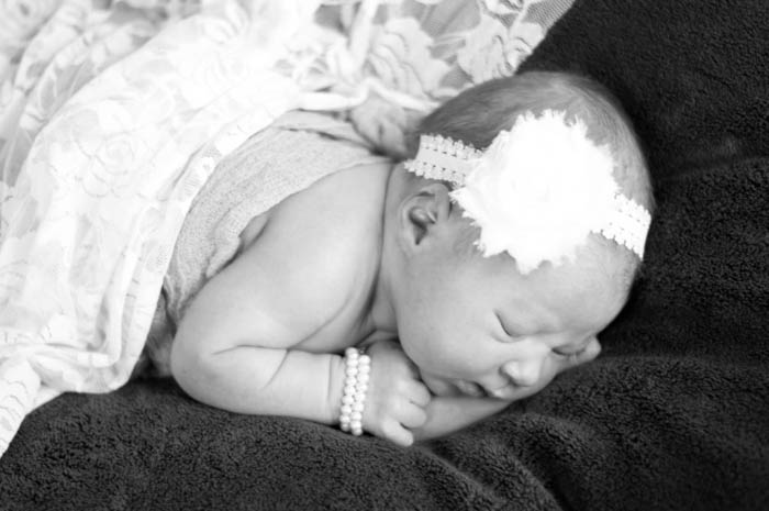 Wait until your newborn is nice and sleepy for the best use of your newborn photography shoot