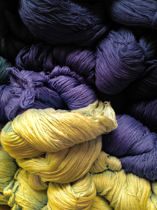 Yellow and purple wool unarranged - complementary colors. 