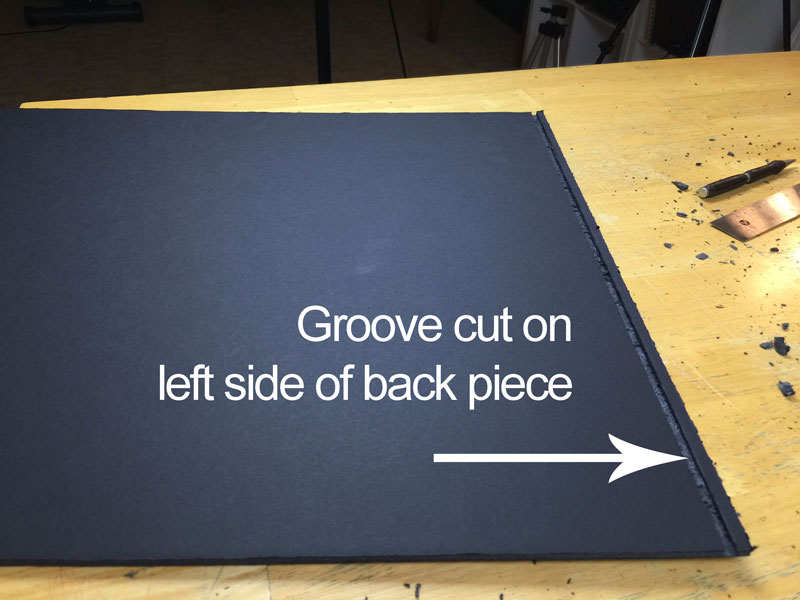 Grooves cut for back piece of the photo box